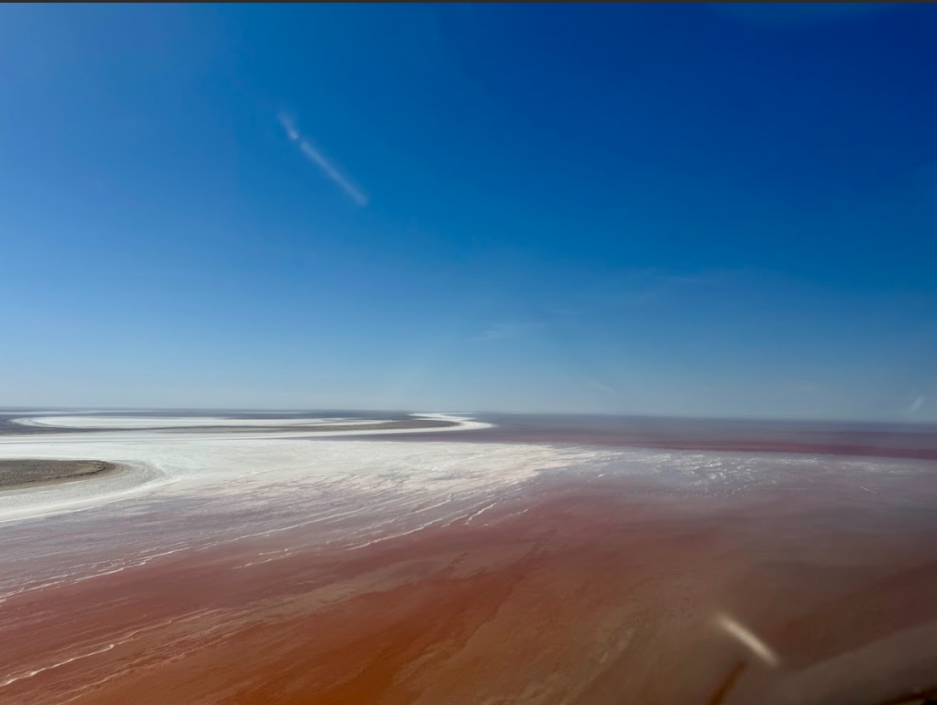 Shallow waters and salt crust of Lake Eyre from a scenic flight
