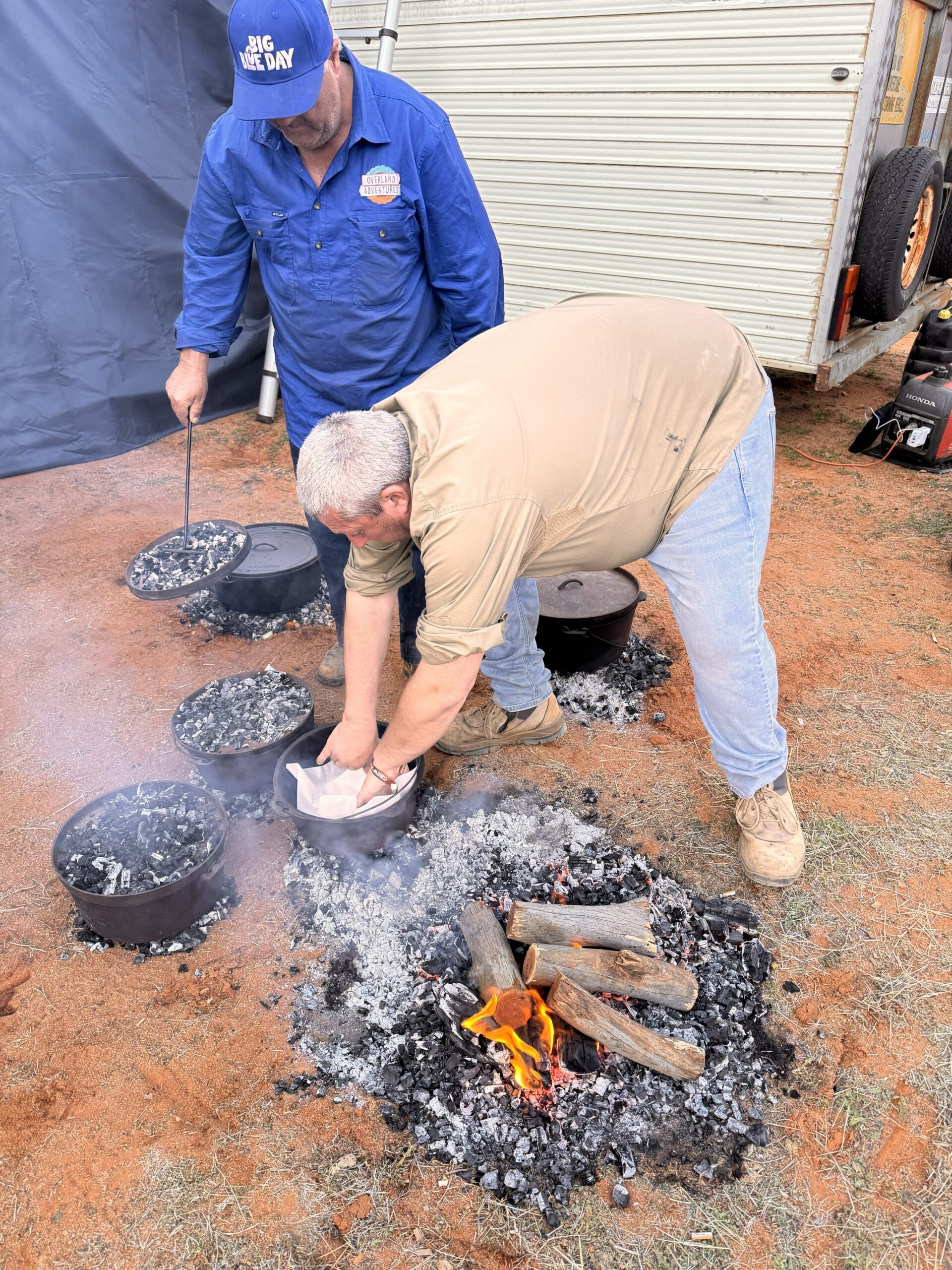 Guides cooking damper in camp ovens over hot coals