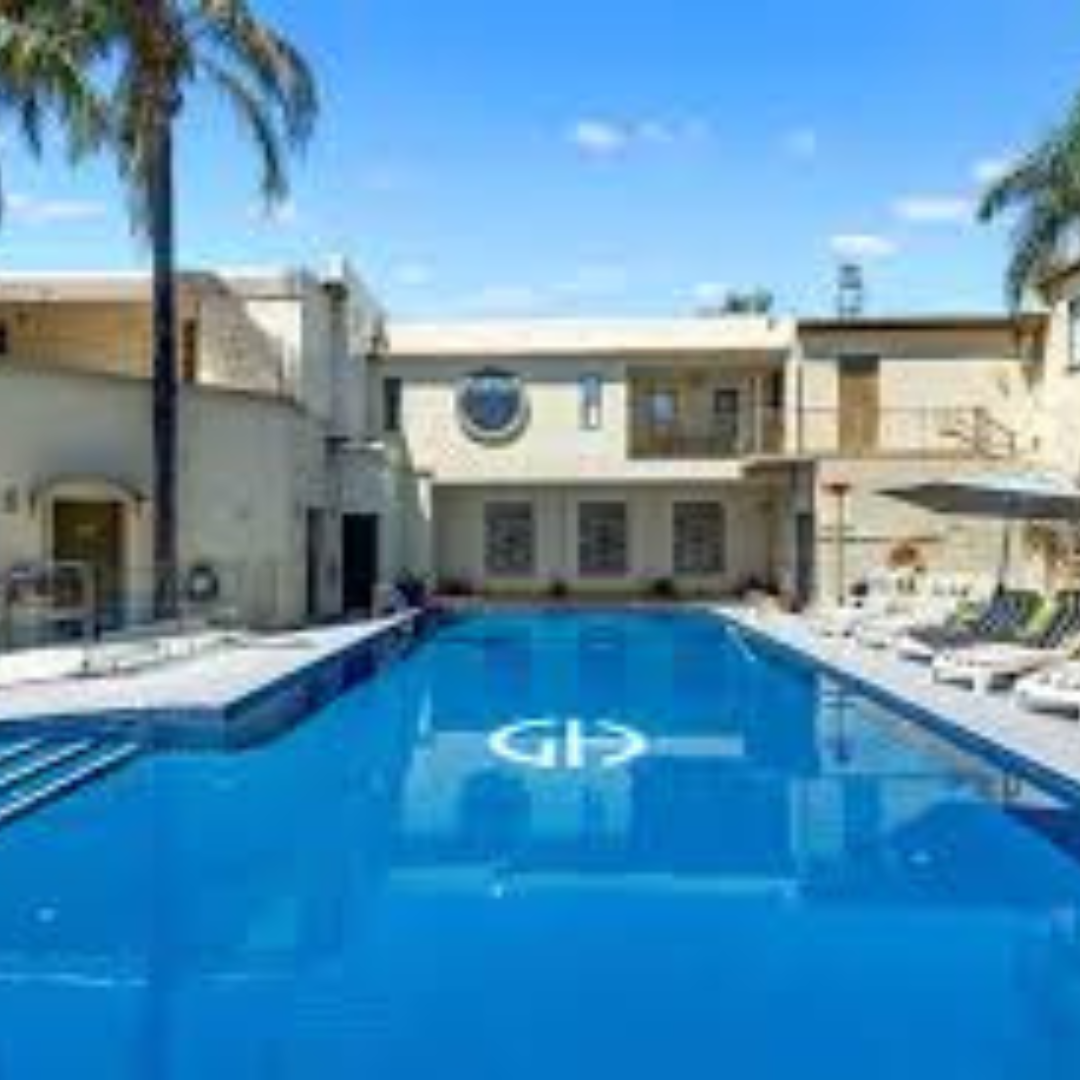 Outdoor pool in the courtyard of the heritage hotel
