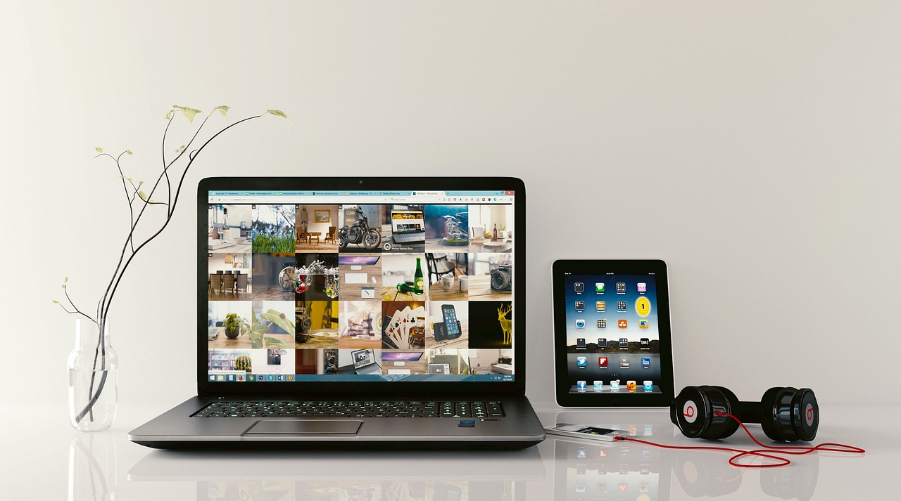 Laptop and tablet showing a responsive website